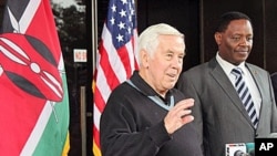 U S. Senator Dick Lugar, left, stands next to Dr. Solomon Mpoke, director of the Kenya Medical Research Institute speaks to journalists in Nairobo, Kenya