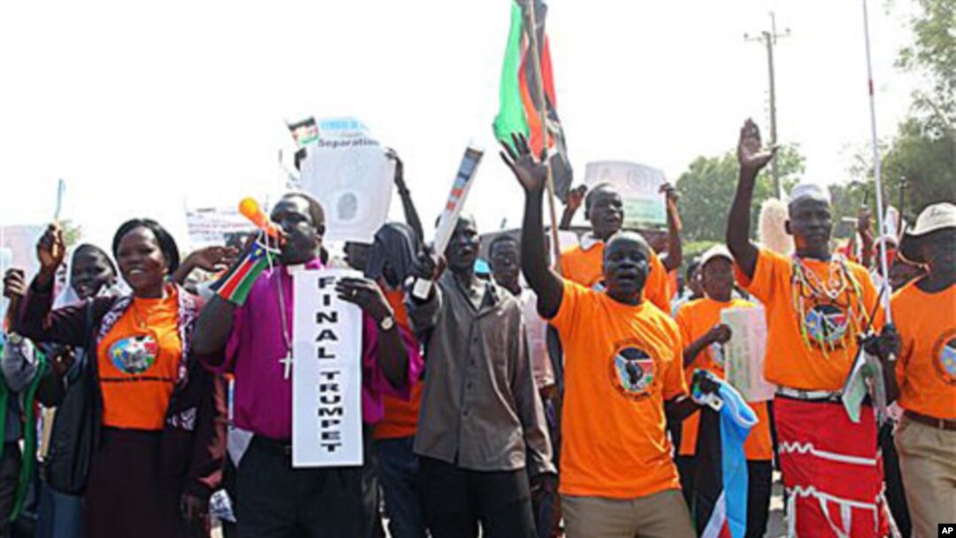 Southern Sudanese citizens clog the streets of the southern capital Juba as they march in support of the upcoming independence referendum, Dec 9, 2010