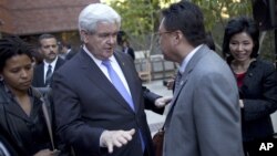 Former Republican presidential candidate Newt Gingrich meets with Asian-Americans at a campaign stop earlier this year. 