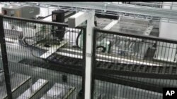 ແຜ່ນຮັບແສງຕາເວັນ ທີ່ພວມເປັນບັນຫາຂັດແຍ້ງ ລະຫວ່າງຈີນກັບສະຫະລັດ (18 ພຶດສະພາ 2012)