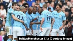 Les joueurs des Manchester City célèbrent après un but, 9 novembre 2017