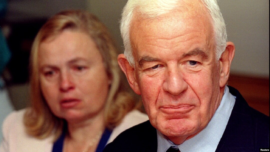 FILE - Tom Foley along and his wife Heather pause at the conclusion of a news conference.