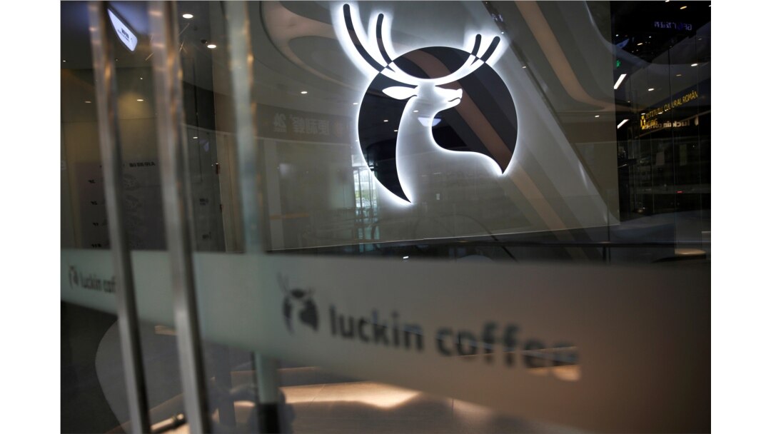 FILE - A Luckin Coffee logo is seen at a closed store in Beijing, following the novel coronavirus disease (COVID-19) outbreak, China, April 16, 2020.
