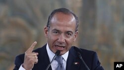 Mexico's President Felipe Calderon gives his State of the Nation address at the National Museum of Anthropology in Mexico City, September 2, 2011.