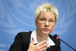 WMO Chief of atmospheric and environment research division Oksana Tarasova attends a press conference Nov. 25, 2019 in Geneva.