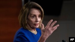 Speaker of the House Nancy Pelosi, D-Calif., talks with reporters during her weekly news conference, on Capitol Hill in Washington, Feb. 7, 2019. 