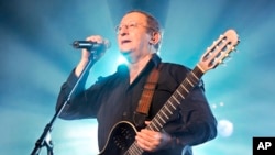FILE - Algerian singer Idir peforms during the 32nd edition of the Paleo Festival in Nyon, Switzerland, Friday, July 27, 2007. The Paleo open-air music festival, the largest in the western part of Switzerland, runs from July 24 to 29.