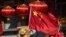 A national flag is seen outside a traditional medicine hospital in Beijing, China, March 3, 2020.