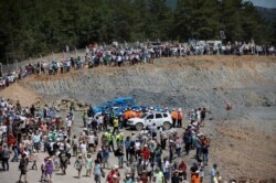 Environmental activists march to protest against what they say will be pollution from a foreign-owned gold mine project near the western town of Kirazli in Canakkale province, Turkey, Aug. 5, 2019.