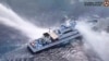 Hình ảnh chụp từ video do Lực lượng Tuần duyên Philippines công bố hôm 30/4 cho thấy tàu BRP Bagacay bị các tàu hải cảnh Trung Quốc phun vòi rồng gần bãi cạn Scarborough ở Biển Đông.