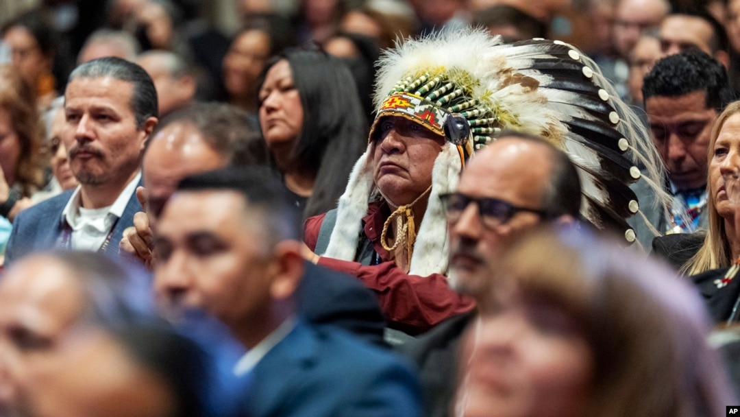 Native American attendees listen as Vice President Kamala Harris speaks during the 2024 White House Tribal Nations Summit, on Dec. 9, 2024, at the Department of the Interior in Washington.