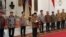 Indonesia's new President Prabowo Subianto, center, announces his cabinet lineup of newly-appointed ministers, at Merdeka Palace, in Jakarta, Indonesia, Oct. 20, 2024. 