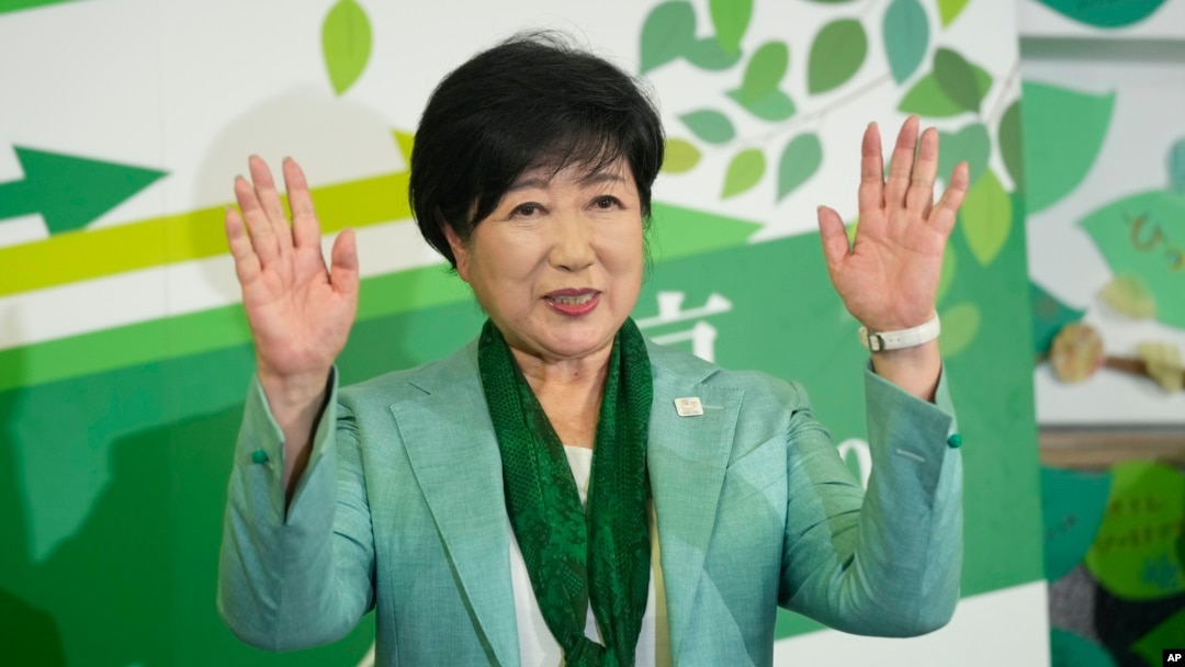 Incumbent Tokyo Gov. Yuriko Koike celebrates after she was elected for Tokyo's gubernatorial election in Tokyo, July 7, 2024.