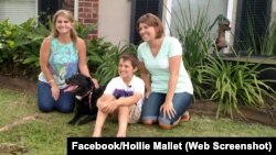 Hollie Mallet, her dog Dutchess, and Josh and Ginger Breaux pose for a photo after their video went viral.