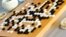 FILE - For the first time, a computer defeated a professional human being in Go, a complex game using black and white pieces on a square grid. 