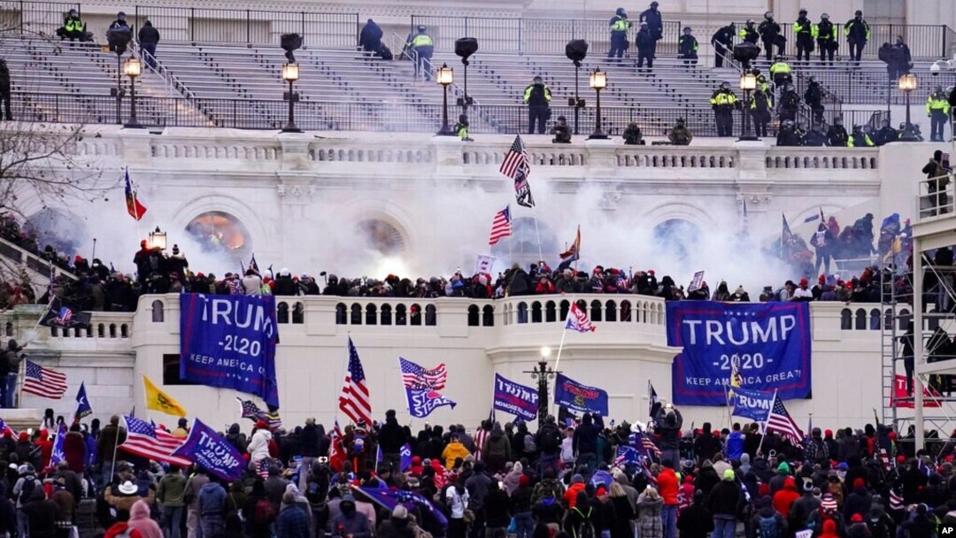 FILE - Protesters loyal to then-President Donald Trump storm the Capitol, Jan. 6, 2021. 