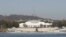 FILE - Australia's Parliament House sits behind Lake Burley Griffin in Canberra, Australia, Thursday, April 24, 2008. 