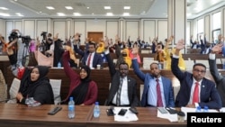 FILE - Somali legislators vote in Mogadishu, Somalia, April 12, 2021. On March 8, 2023, the lower house of Somalia’s Parliament approved a new anti-terrorism law.