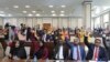 FILE - Somali legislators of the lower house of parliament take a vote, in Mogadishu, Somalia, April 12, 2021.