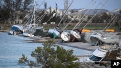 Damaged sail boats are shown in the aftermath of Hurricane Irma, Sept. 11, 2017, in the Florida Keys.