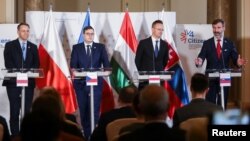 Para Menlu 4 negara: Republik Ceko, Polandia, Hungaria dan Slowakia bertemu di Praha hari Kamis (21/3). 