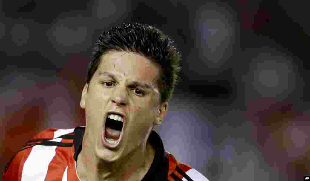 Argentina's Estudiantes de La Plata's Guido Carrillo celebrates his goal against Argentina's River Plate at a Copa Sudamericana soccer match in Buenos Aires, Argentina.