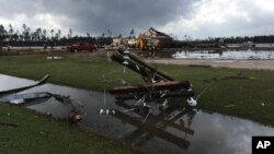 Kerusakan akibat tornado di In Cook County, Georgia (22/1). (AP/Brendan Farrington)