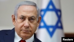 Israel's Prime Minister Benjamin Netanyahu chairs the weekly Cabinet meeting in Jerusalem, Nov. 18, 2018.