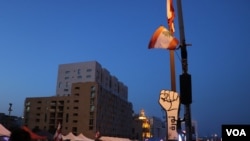 For more than a month, demonstrators have been gathering across Lebanon, demanding government resignations and economic improvements, pictured in Beirut, Nov. 17, 2019. (Heather Murdock/VOA)