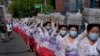 Umat Hindu di Bali membawa persembahan dalam perayaan Hari Raya Galungan di desa Lukluk, Badung, Bali, pada 14 April 2021. (Foto: Nyoman Hendra Wibowo/Antara Foto via Reuters)