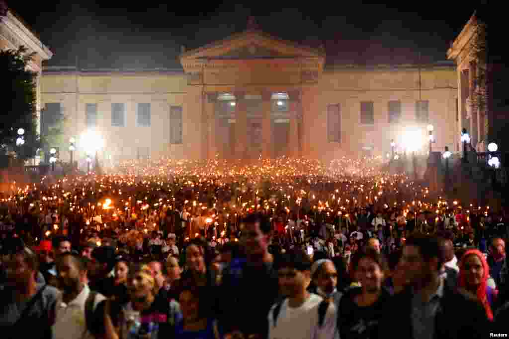 People attend the March of Torches, which is held annually in celebration of the birth anniversary of Cuba&#39;s independence hero Jose Marti, in Havana, Jan. 27, 2025.