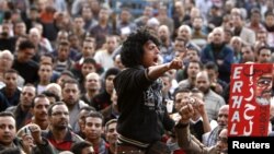 Anti-Morsi protesters chant anti-government slogans at Tahrir Square in Cairo, December 11, 2012.