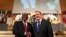 South African President Cyril Ramaphosa and Sweden's PM Stefan Lofven shake hands at the opening day of the ILO's annual conference in Geneva, June 10, 2019.