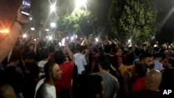 Protesters chant slogans against the regime in Cairo, Egypt, early Saturday, Sept. 21, 2019. 