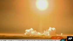 Video image from Iranian state TV shows the launch of a rocket carrying a Payam satellite at Imam Khomeini Space Center, a facility under the control of the country's Defense Ministry, in Semnan province, Iran, Jan. 15, 2019. 