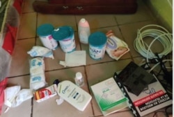 Artificial milk and injections given to the babies to sleep, Yaounde, Cameroon, Jan. 16, 2021. (Moki Edwin Kindzeka/VOA)