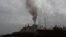FILE - Smoke rises from a coal-fired power plant in Obilic near Pristina, Kosovo, Nov. 1, 2018. 