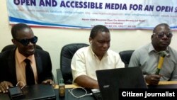 NASA astronaut Christina Hammock Koch, a member of the International Space Station (ISS) expedition 59/60, gestures from inside a bus at a farewell ceremony outside the Cosmonaut hotel prior to launch onboard the Soyuz MS-12 spacecraft from the Russian-leased Baikonur cosmodrome in Kazakhstan.