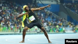  Usain Bolt of Jamaica celebrates winning the gold medal on Sunday.