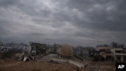 FILE - A mosque destroyed in the Israeli ground offensive on the Gaza Strip is seen in Khan Younis, January 27, 2024.