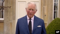 In this grab taken from video, Britain's Prince Charles addresses the media, outside Highgrove House in Gloucestershire, England, Saturday, April 10, 2021.