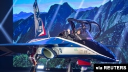 Taiwan's President Tsai Ing-wen attends an unveiling ceremony for a prototype of advanced jet trainer "Brave Eagle" in Taichung, Sept. 24, 2019. (Military News Agency/Handout)