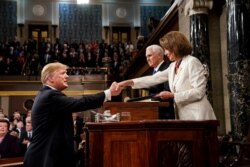 President Donald Trump before delivering the State of the Union address, with Vice President Mike Pence and Speaker of the House Nancy Pelosi, at the Capitol in Washington, Feb. 5, 2019.