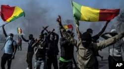 (FILE) Demonstrators protest in Dakar, Senegal.