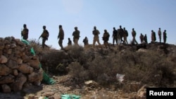 Puntland security forces patrol after capturing Islamic State bases in the Cal Miskaad mountain range in Bari, east of the Gulf of Aden in the city of Bosaso, Puntland region, Somalia, Jan. 25, 2025.