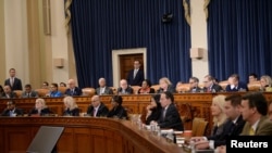 Members of the U.S. House Judiciary Committee vote to approve two articles of impeachment against U.S. President Donald Trump on Capitol Hill in Washington, U.S., December 13, 2019. 