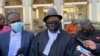 Veteran lawyer Tendai Biti, who represented Musa Kika, is seen speaking to journalists outside Zimbabwe's High Court in Harare, May 15, 2021. (Columbus Mavhunga/VOA)