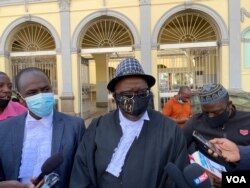 Veteran lawyer Tendai Biti, who represented Musa Kika, is seen speaking to journalists outside Zimbabwe's High Court in Harare, May 15, 2021. (Columbus Mavhunga/VOA)