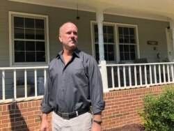 FILE - Gerald Bostock, one of the plaintiffs in the Supreme Court case about LGBT rights, poses outside his home in Atlanta, Georgia, September 9, 2019.