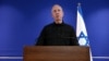 FILE - Former Israeli Defense Minister Yoav Gallant speaks to members of the press at the Ministry of Defense in Tel Aviv, Israel, Nov. 5, 2024. 